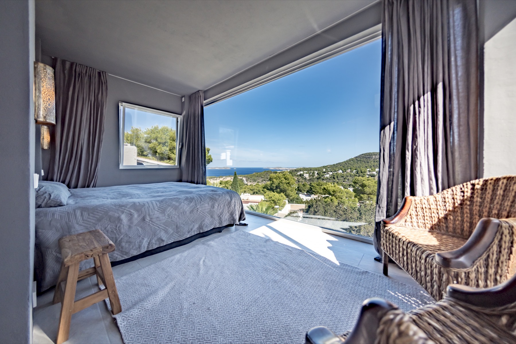 Cala Vadella bedroom opening towards the sea