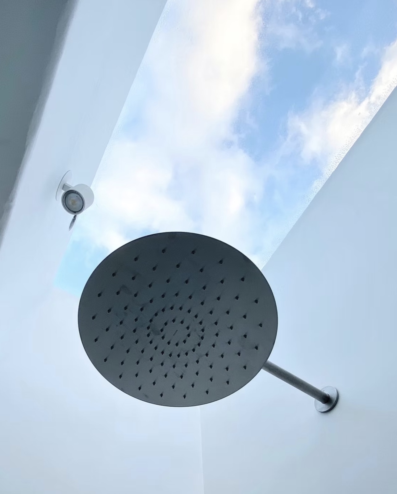 Open-air shower and framed sky